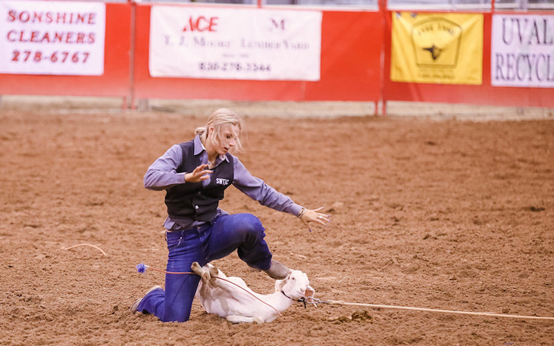 PHOTO: Shaye Lynn Jesse in the goat tying competition at the 55th Annual SWTJC Rodeo at the Uvalde County Fair Plex Rodeo Arena.